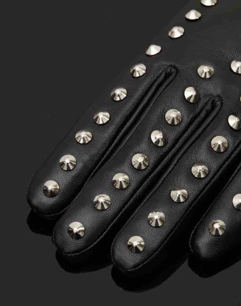 A closeup of the rivets on the Spiked Leather Forearm Glove.