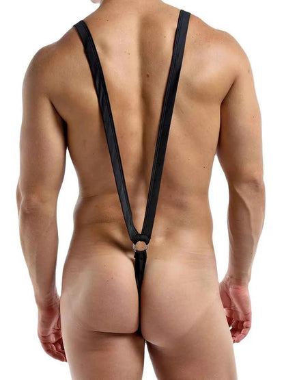 A model showing the back of the black Euro Sling Suspender Thong.