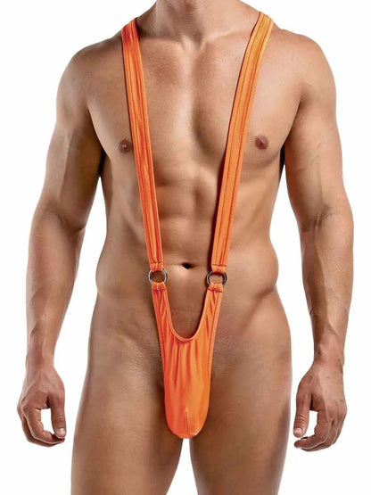A model showing the front of the orange Euro Sling Suspender Thong.