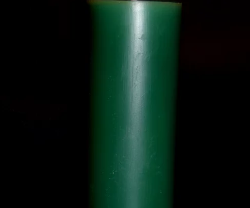 Close up of a green candle.