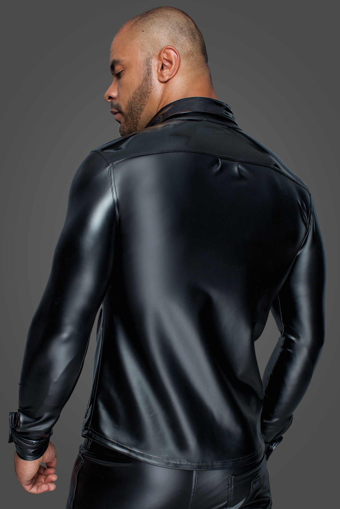Model showing the back of the Long Sleeved Power Wetlook & PVC Shirt.