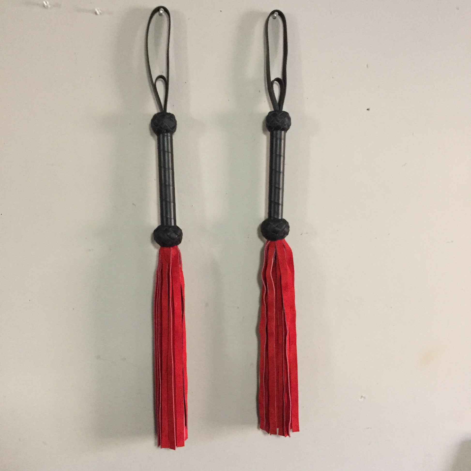 A pair of Red Basic Suede Floggers.