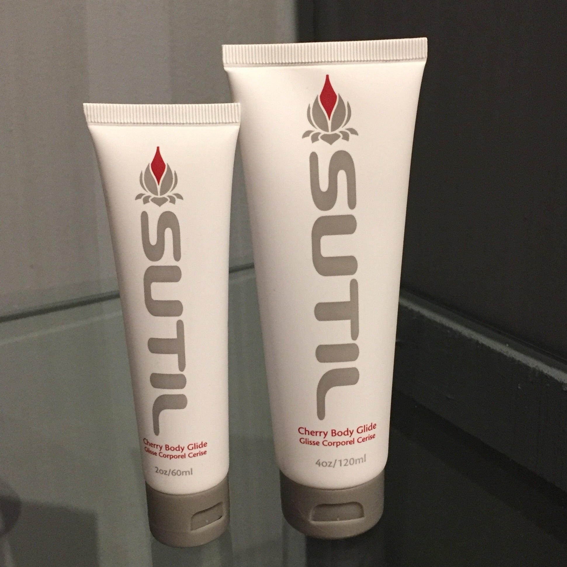 Sutil Flavoured Body Glide Cherry in 2oz and 4oz bottles.