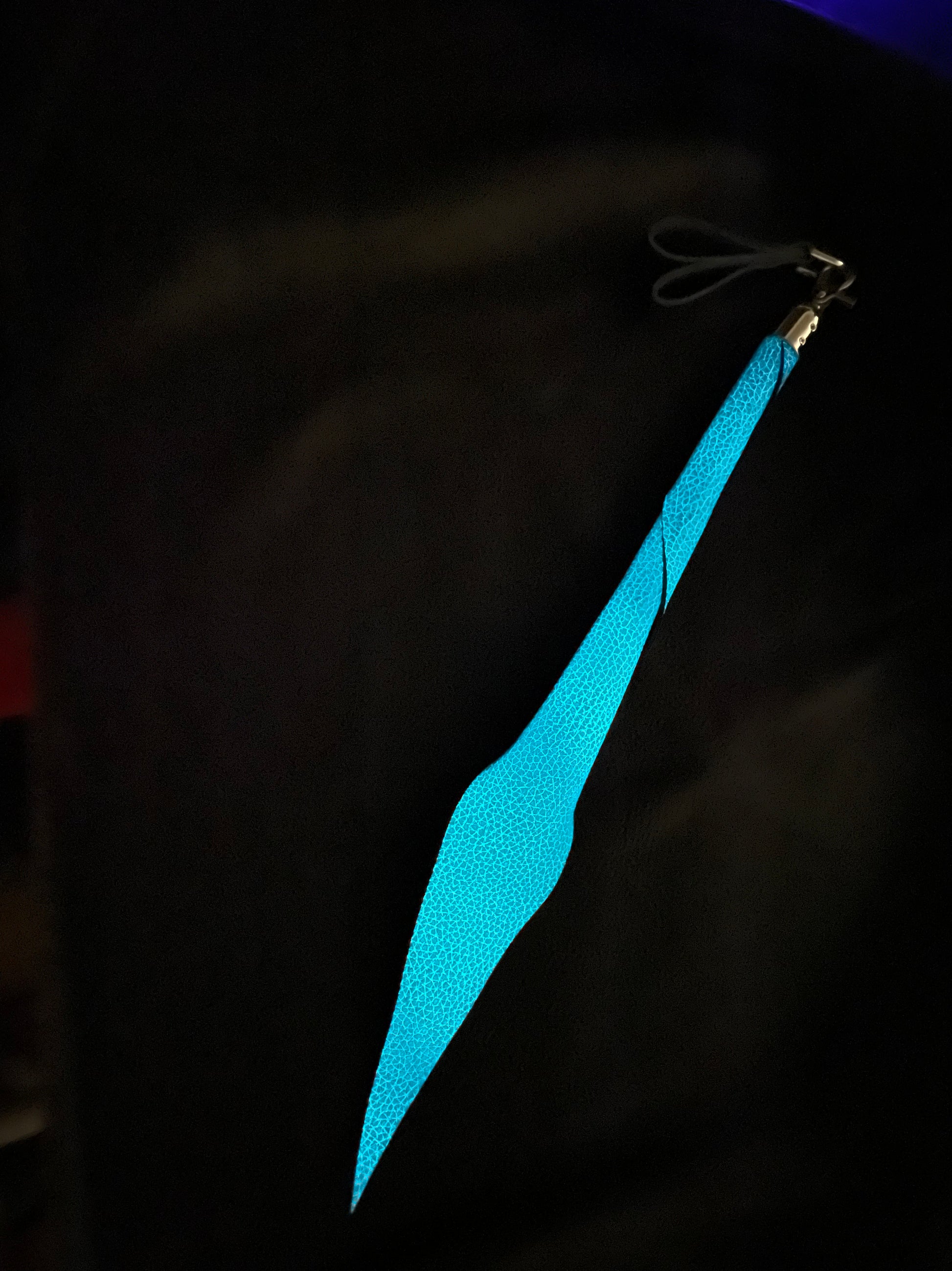 The teal Glow Leather Whiplet Mini Dragontail.