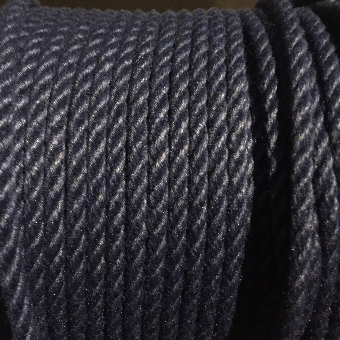 A spool of grey POSH Colorfast Synthetic Hemp Jute Rope.