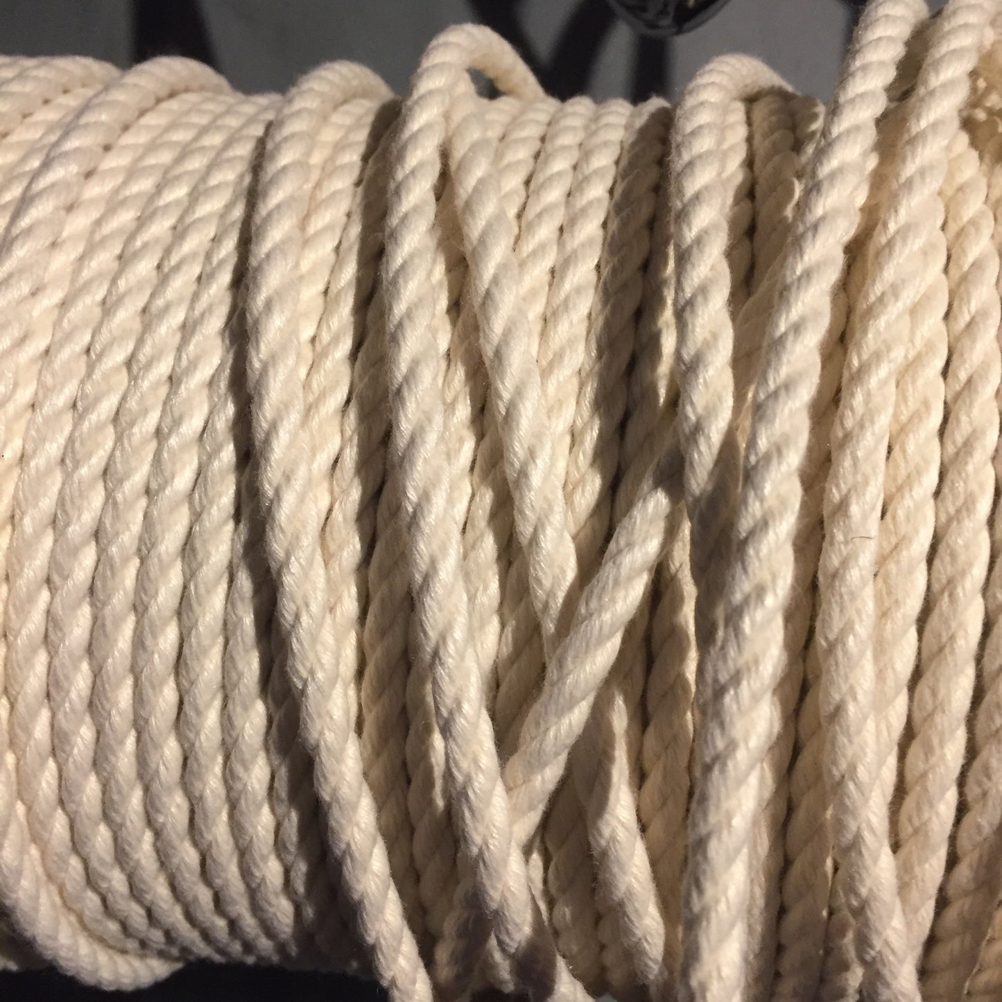 A spool of egshell POSH Colorfast Synthetic Hemp Jute Rope.