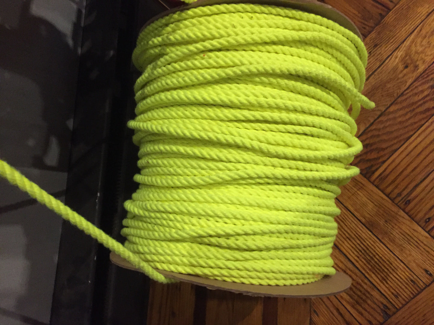 A spool of yello POSH Colorfast Synthetic Hemp Jute Rope.