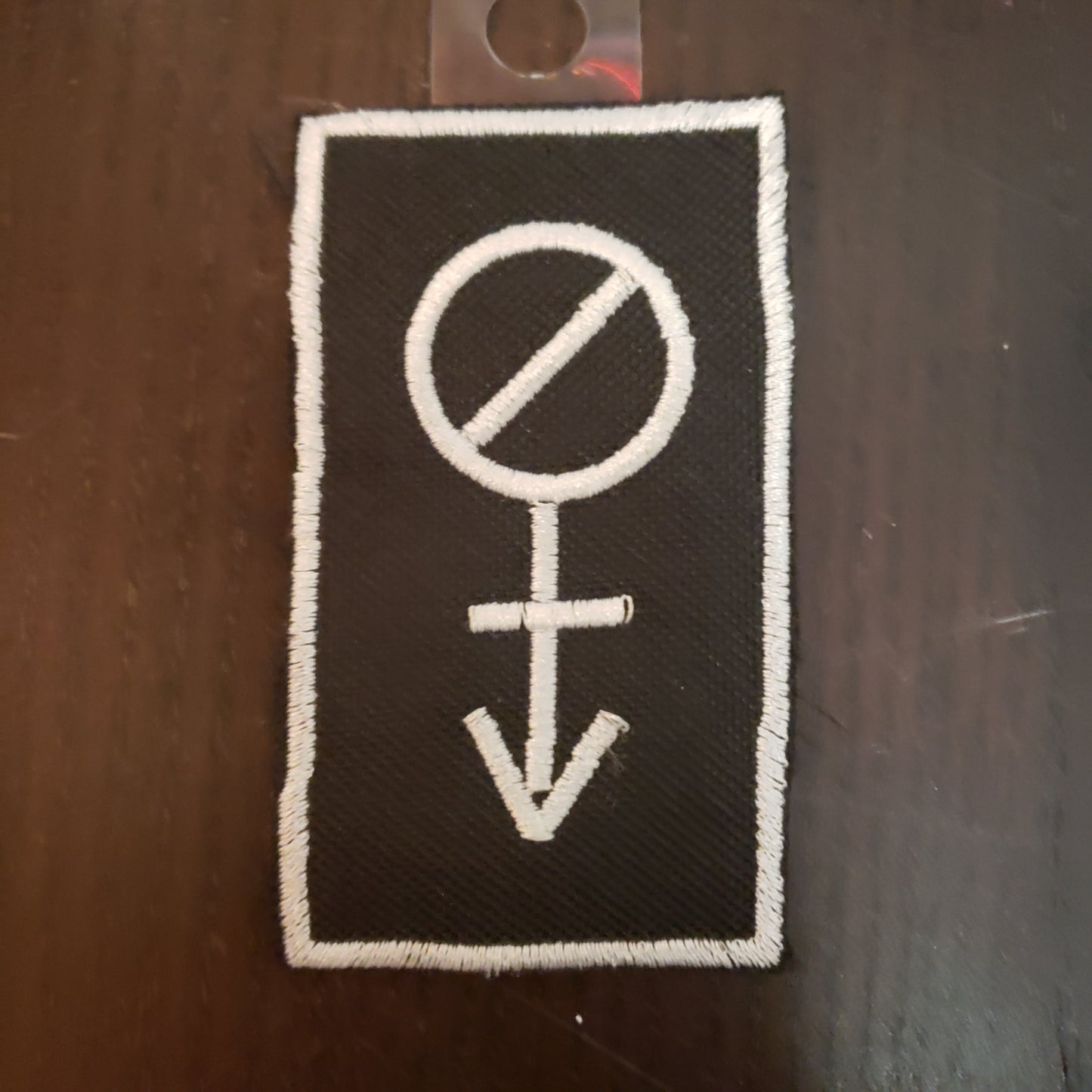 The Agender Leather Bar Lapel Patch.