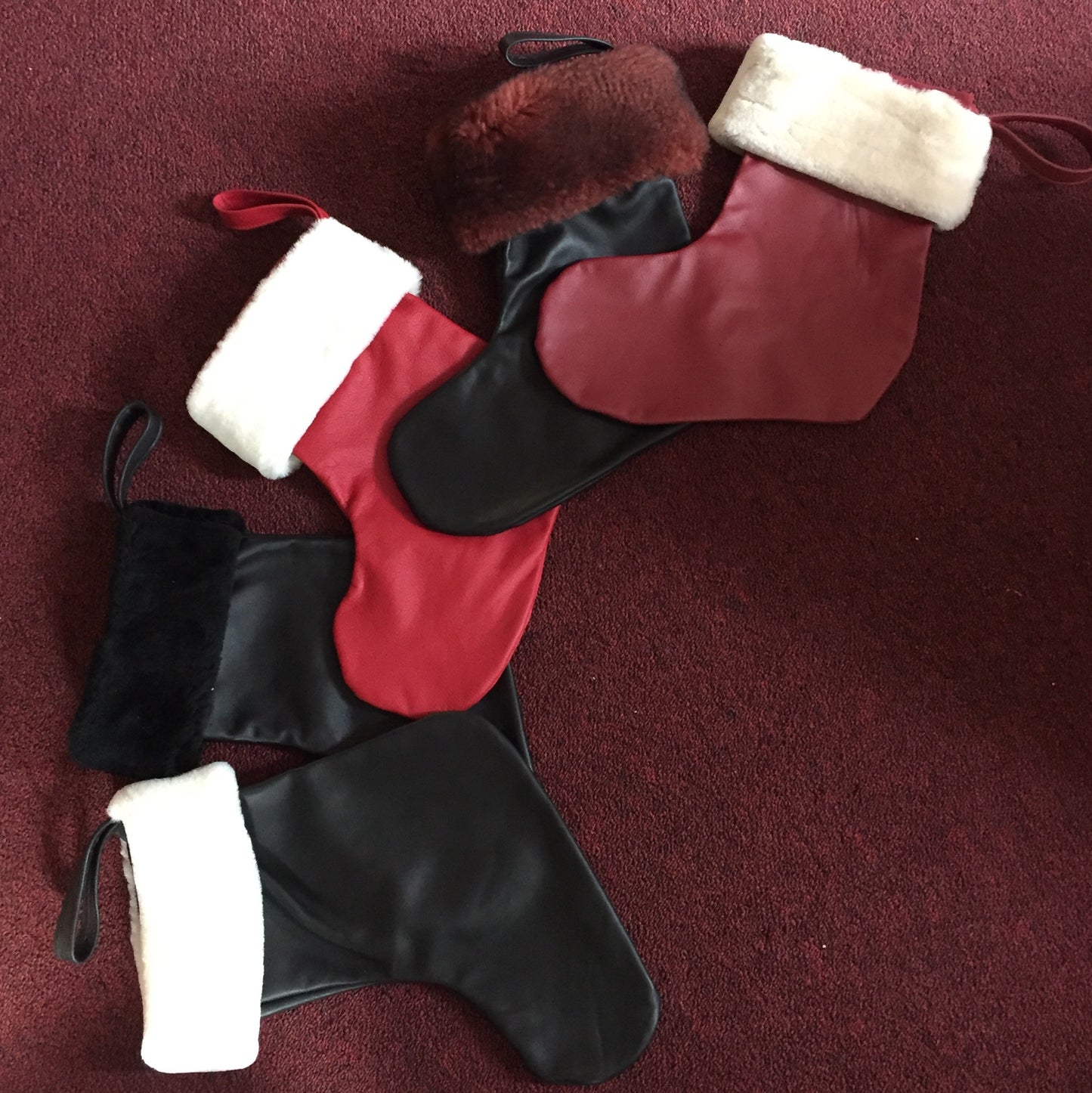 Fur trimmed leather gift stocking in assorted leather and sheerling colors