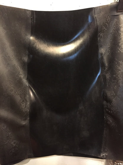 A close up of the front of the full black Latex Girdle Mini Skirt.