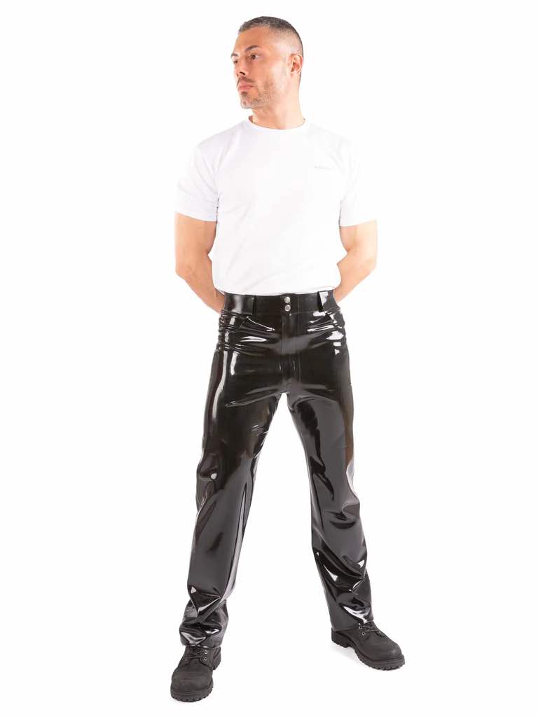 A model wearing a white t-shirt and the Latex Jeans with Front & Back Pockets, front view.