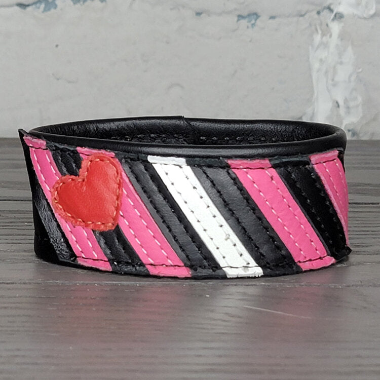 The Leather Girl Pride Flag Leather Wrist Cuff.