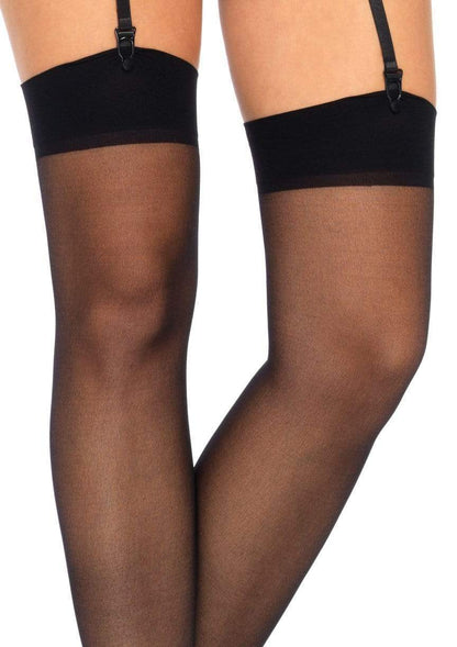 A closeup of the wide band on the black Classic Sheer Stockings.
