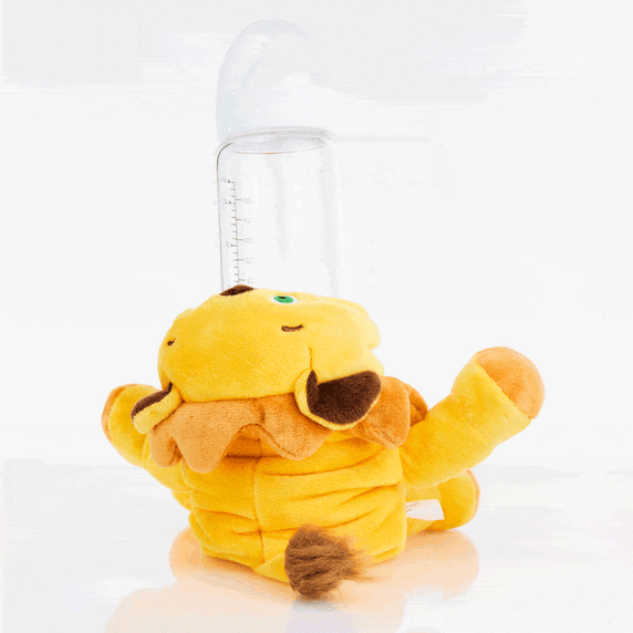 A gif of the Safari Lion Bottle Buddy spinning around and sliding down a glass bottle.