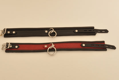 A red and a black Rolled Deluxe Collar displayed parallel to each other.