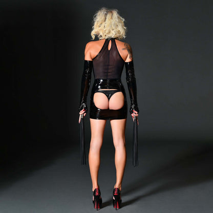 A model showing the back of the Vinyl Spanking Skirt for Narrow Hips.