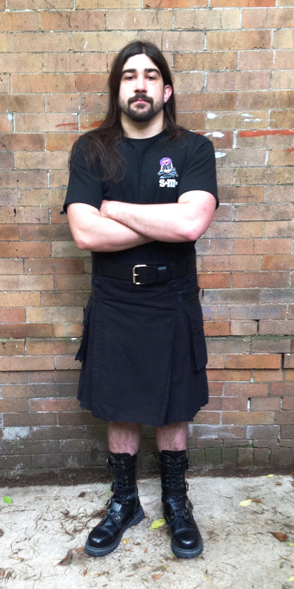 Model displaying the front of the black Cargo Kilt.