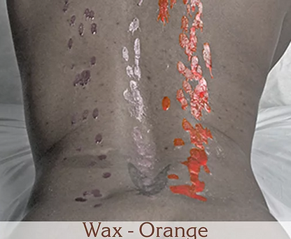 Orange wax melted on a model's back.