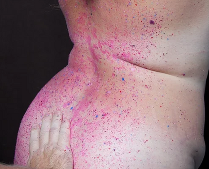 Purple wax melted on a model's back.