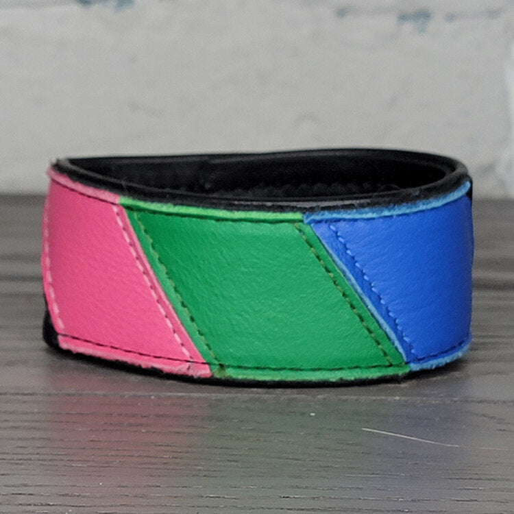 The Poly Pride Flag Leather Wrist Cuff.