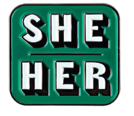 SHE/HER green backgroun with white lettering enamel pronoun pin