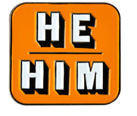 HE/HIM orange background with white lettering enamel pronoun pin