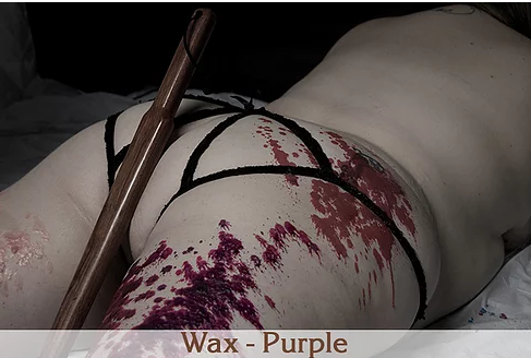 Purple wax melted on a model's back.