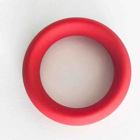 The red Meat Rack Cock Ring.
