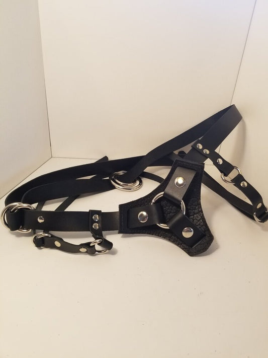 Black rapture strap on harness.