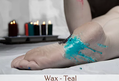 Teal wax melted on a model's foot.