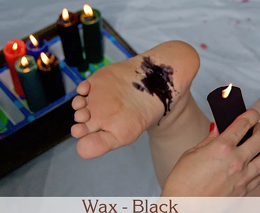 Black wax melted on a model's foot.