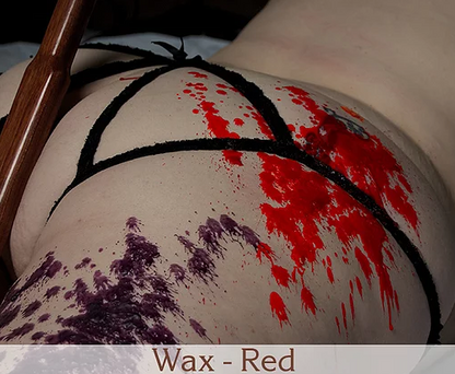 Red wax melted on a model's body.